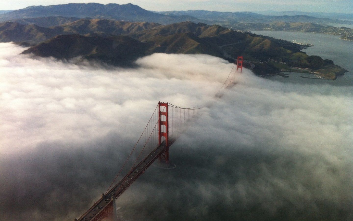 Golden Gate Bridge, California The Golden Gate Bridge and fog—two enduring San Francisco institutions. ( via )