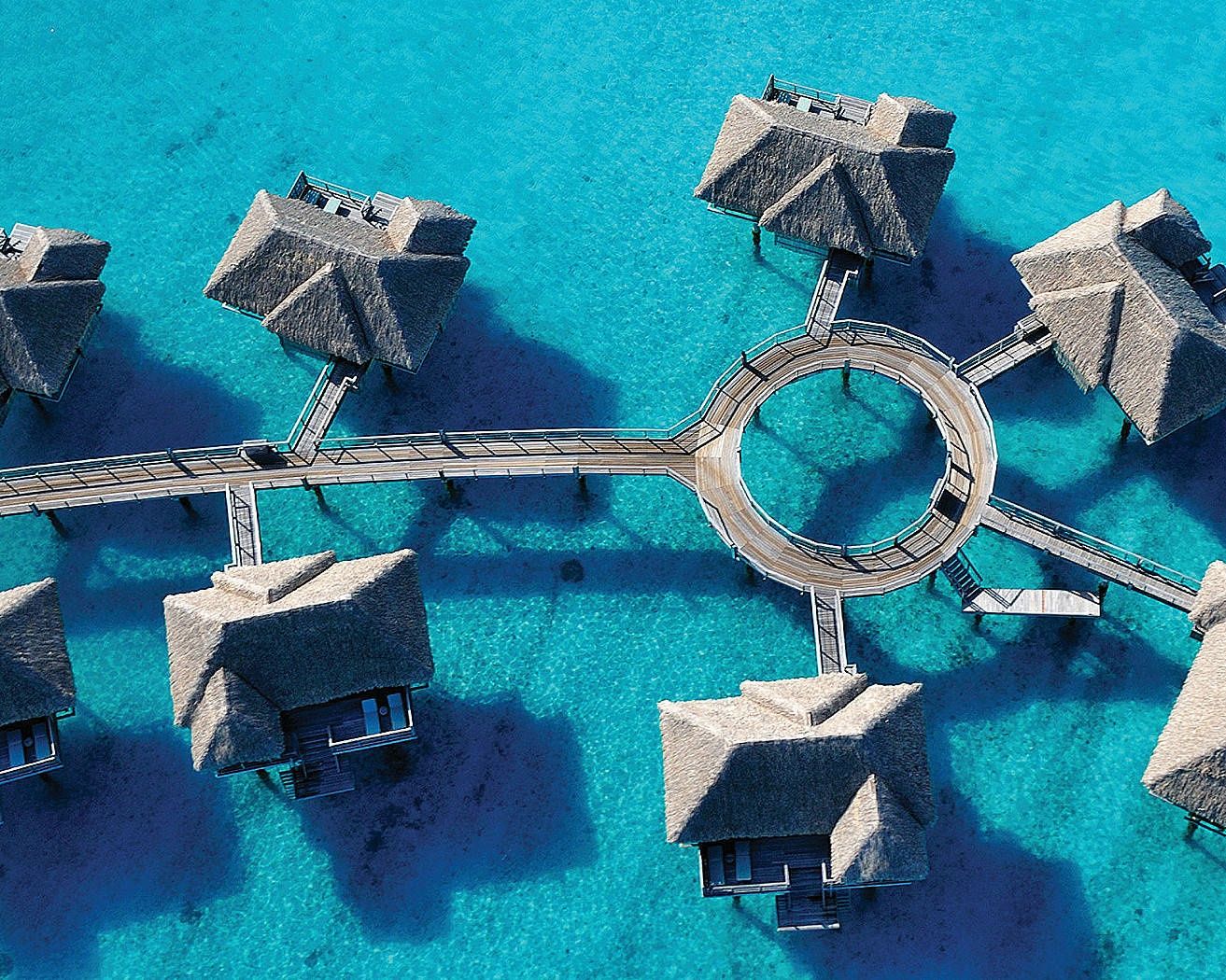 Bora Bora, French Polynesia Ahhh, translucent turquoise water and perfect symmetry.