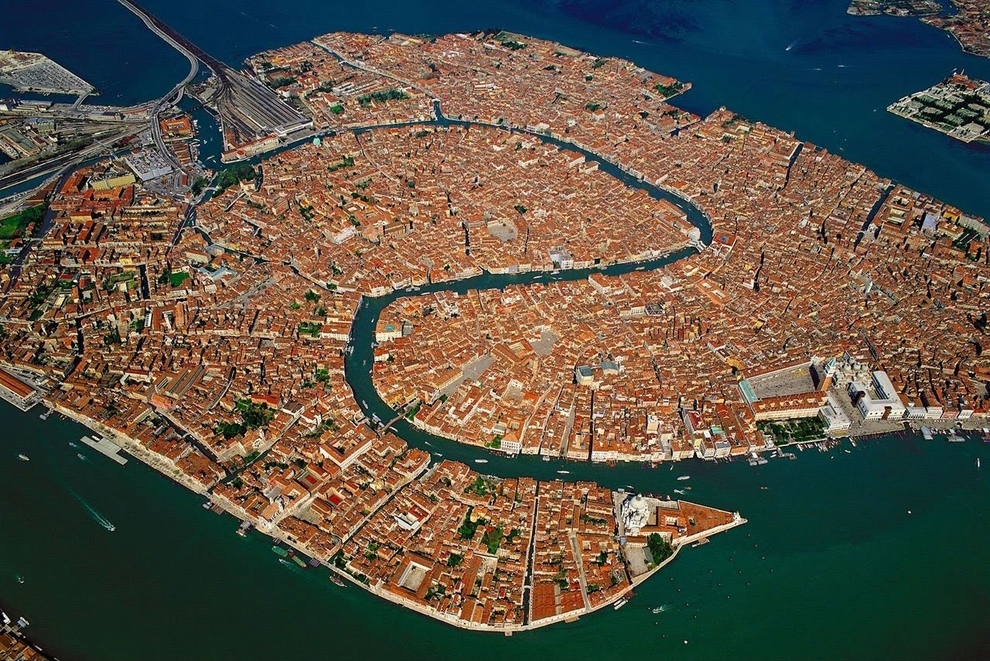 Venice, Italy The entire city of Venice is named a UNESCO World Heritage Site, thanks to the fact that it’s absolutely stunning and, you know, has canals instead of roads. ( via )