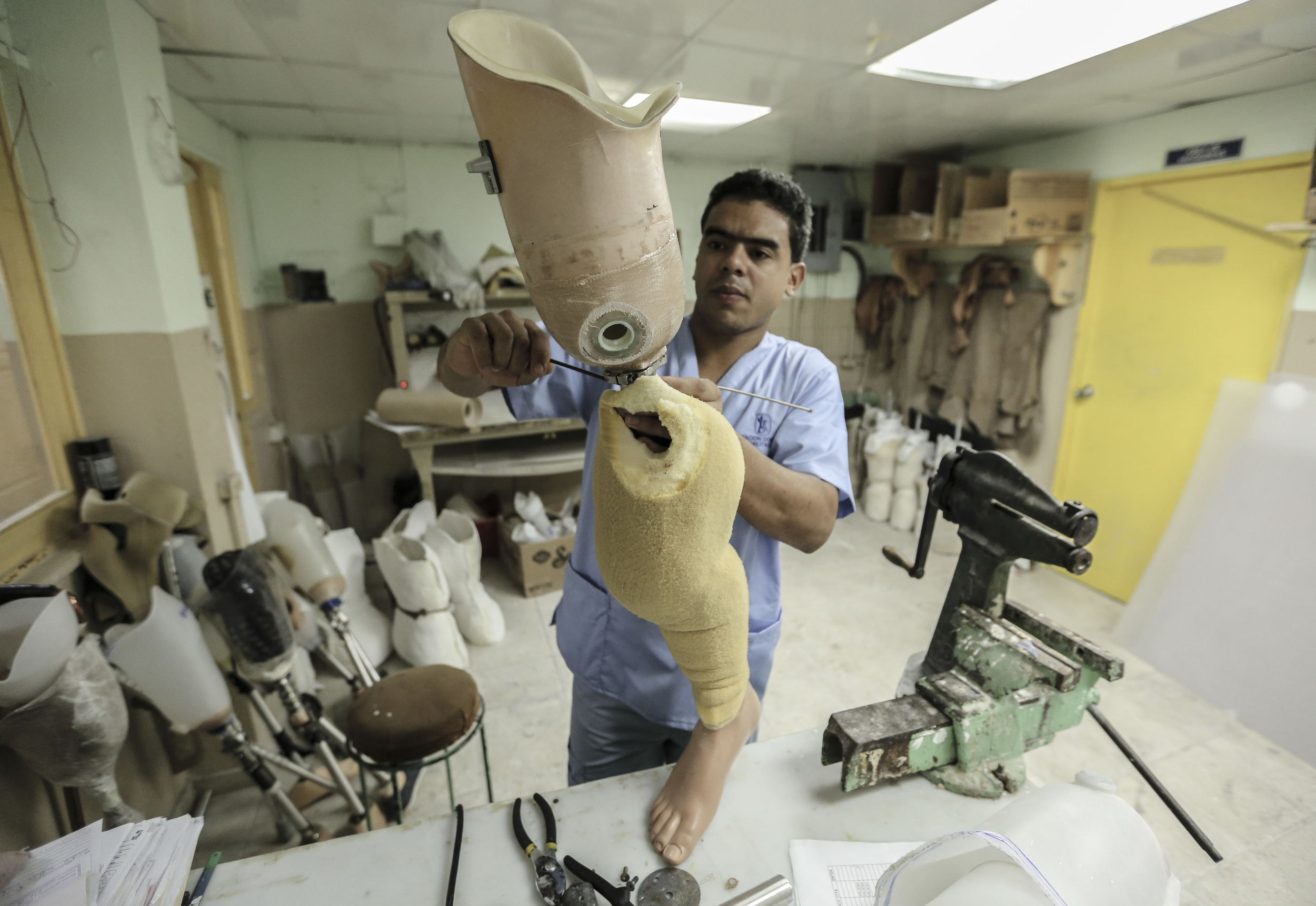  Working on prosthetics in Santo Domingo, Dominican Republic. 