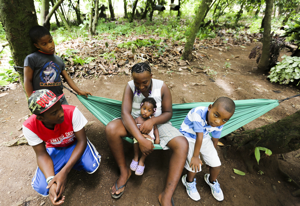  A family outside of Santo Domingo, Dominican Republic. 