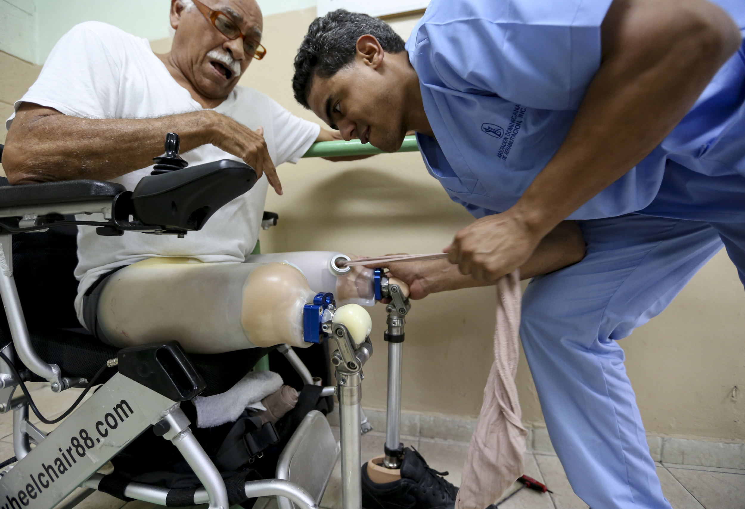  A double amputee gets his prosthetics fitted in Santo Domingo, Dominican Republic. 