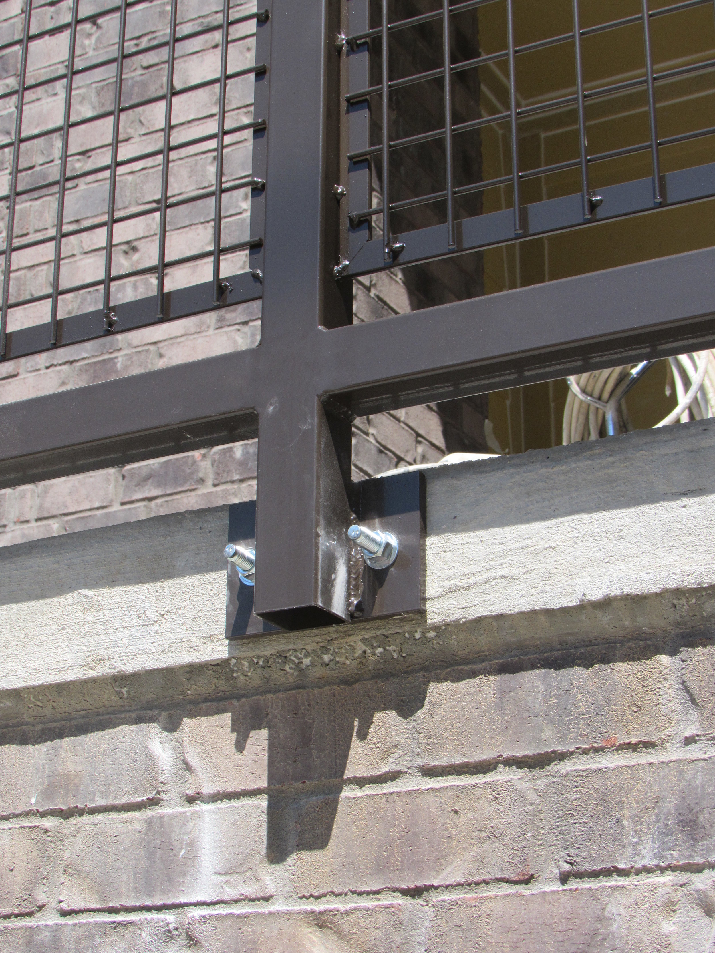  railing, concrete, &amp; brick detail, mid-construction 