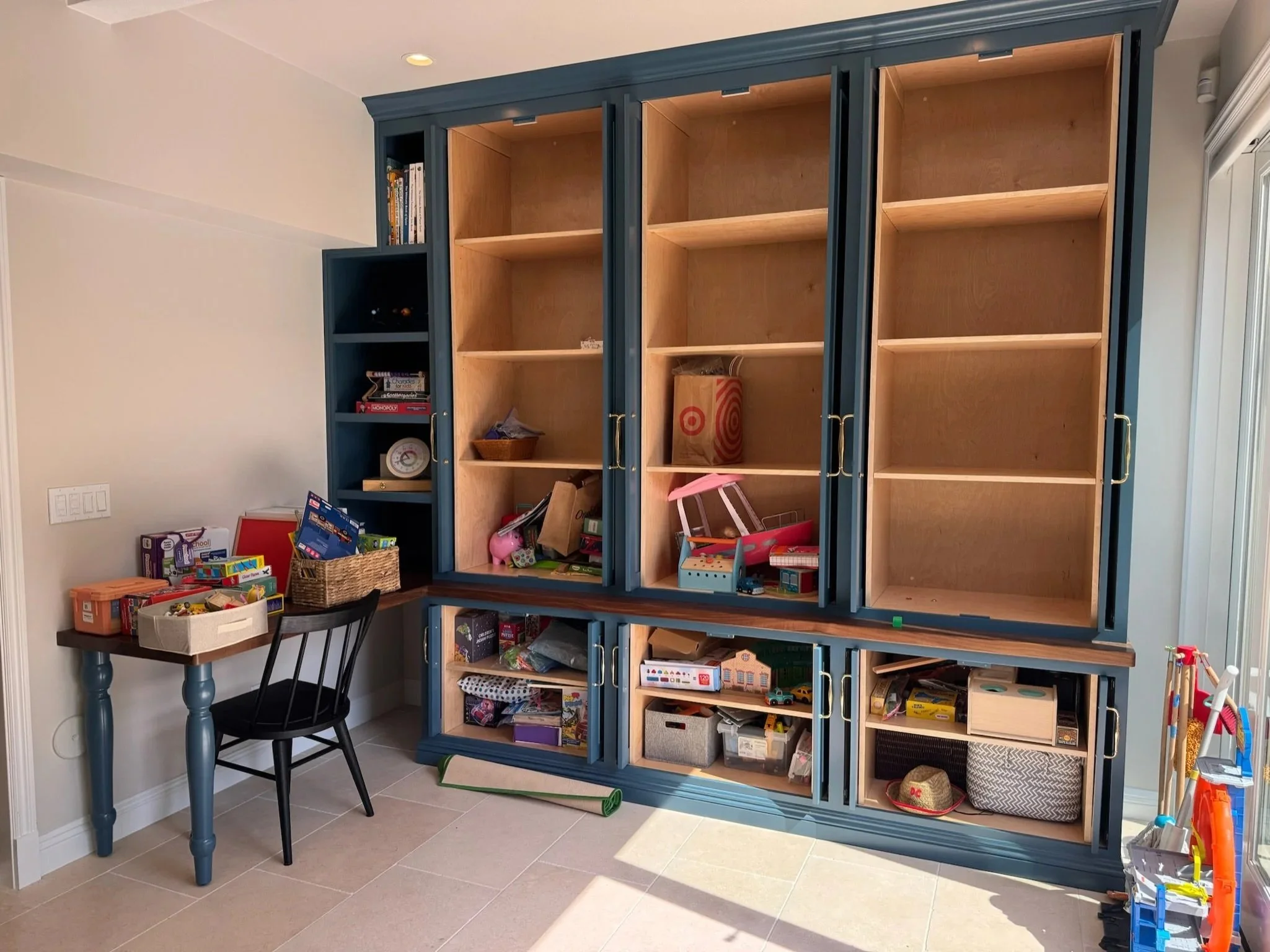Before - Toy Cabinet Organization