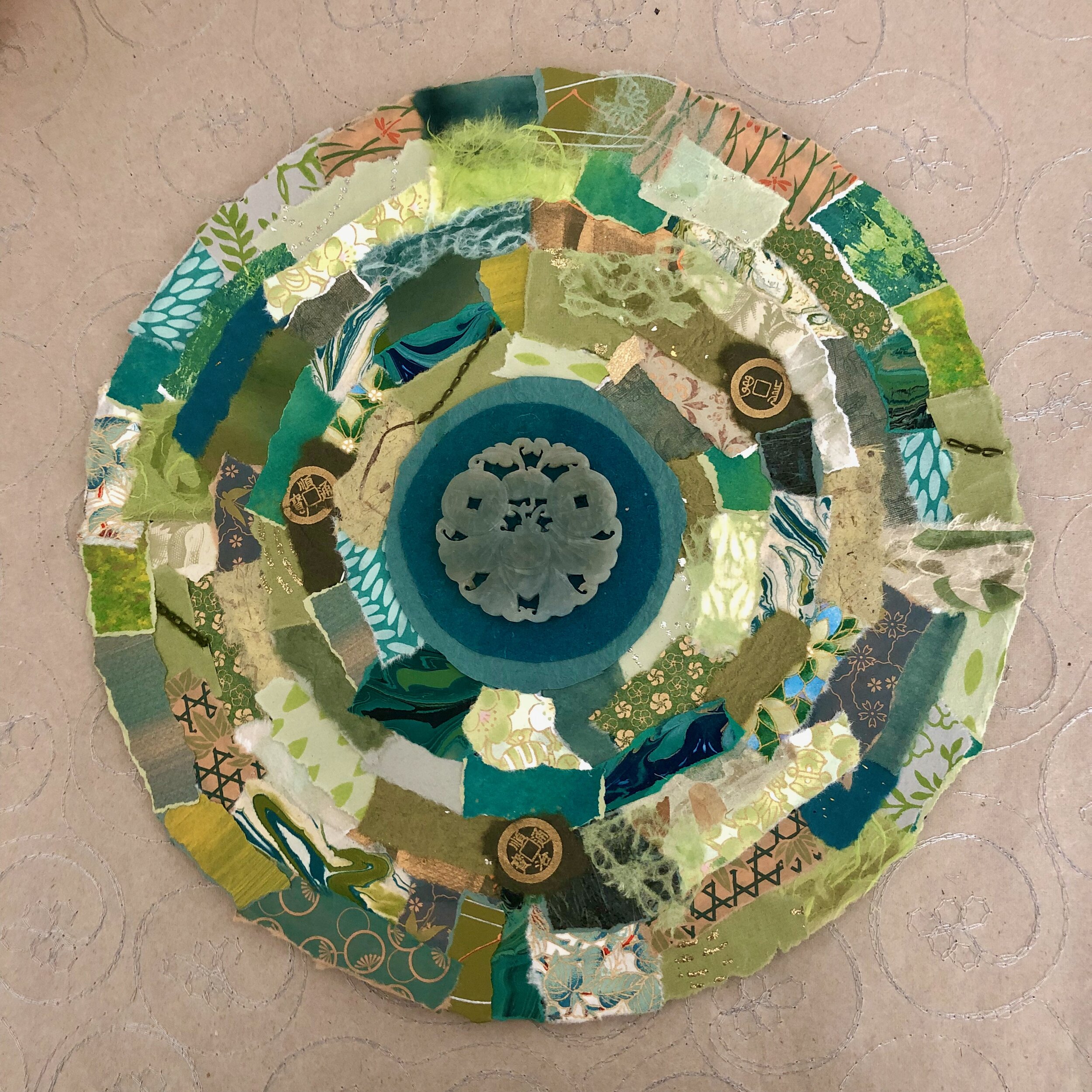 Labyrinth 19  Cut and torn fine papers; vintage jade piece   2019