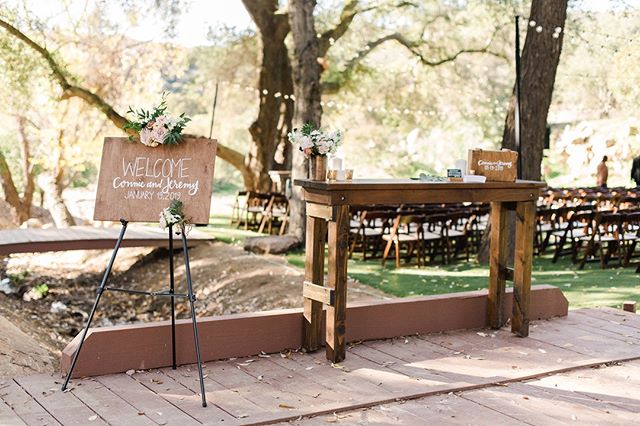 This was the welcome table for our wedding! Instead of having people sign a traditional guest book, we wanted something a bit different. So we had blank cards for our guests to write us a word of encouragement and we built a little box to drop the ca