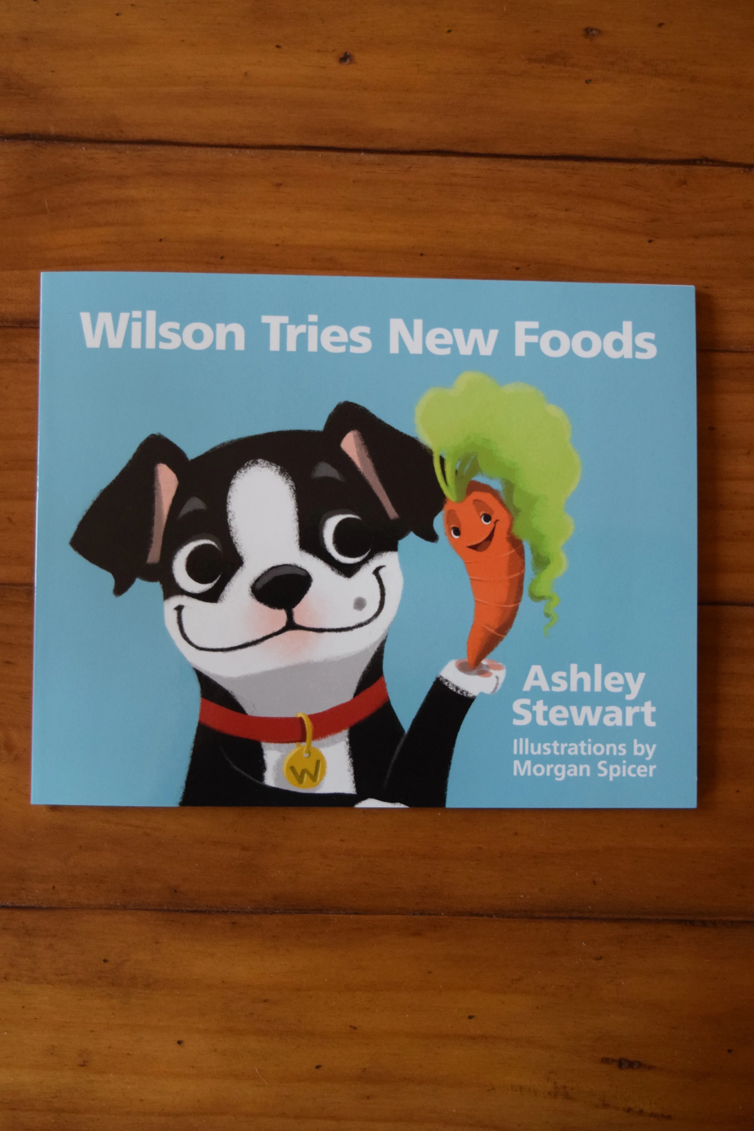 Join Wilson, the Boston terrier, on a path to healthier eating with your kids! visit eatwellwithwilson.com to purchase! 