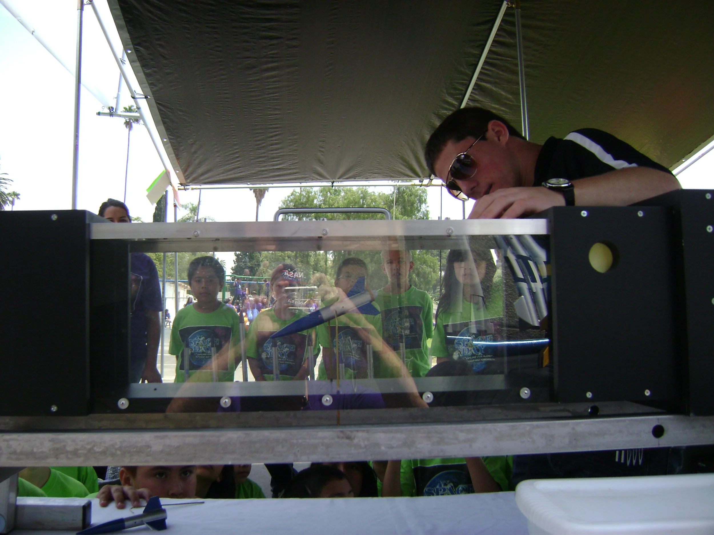  A wind tunnel powered by two industrial fans shows the basics of rocket stability to a crowd of elementary school students at Lockeed Martin's Space Day.&nbsp; 