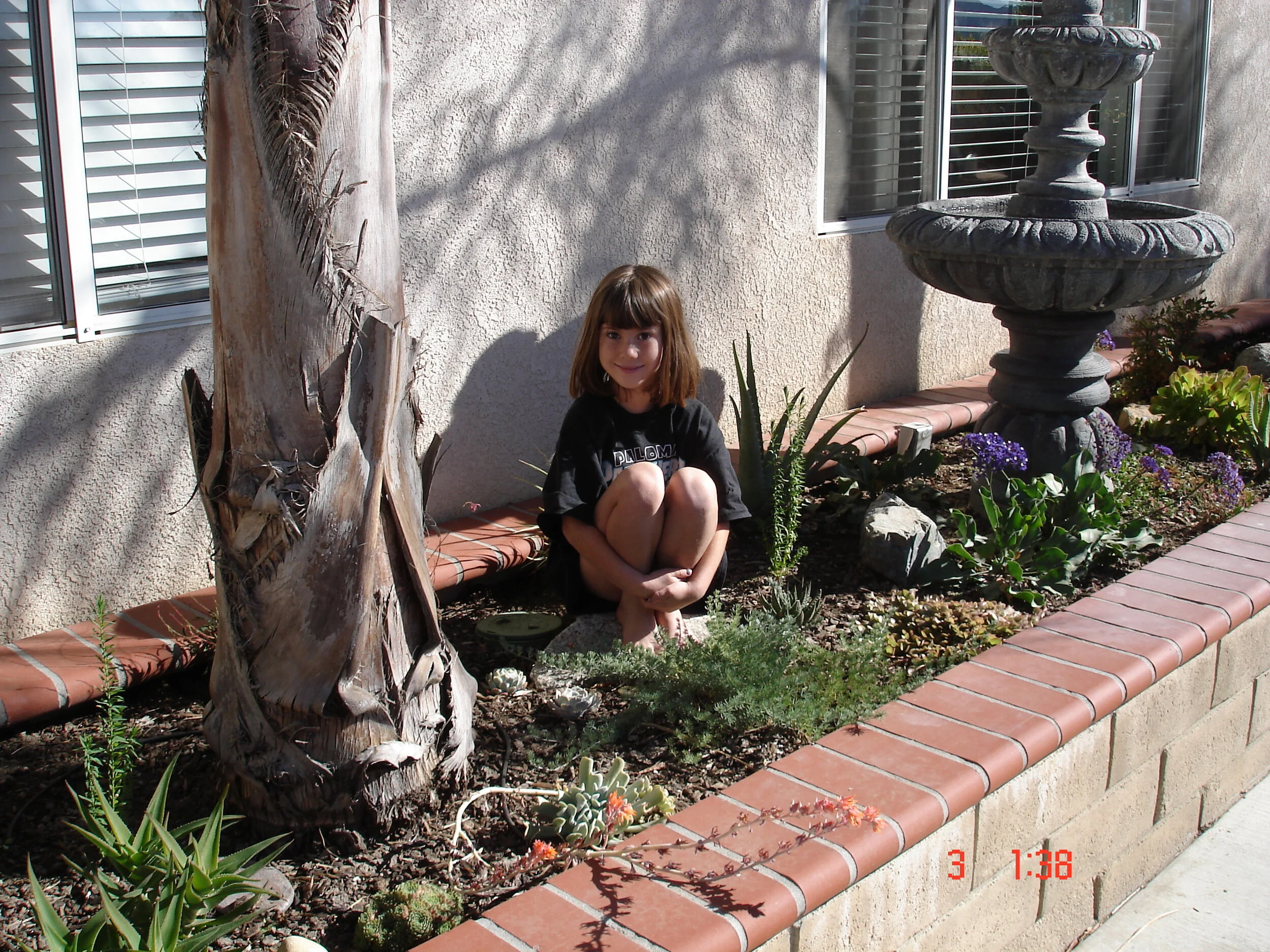 Amy on the back patio.JPG
