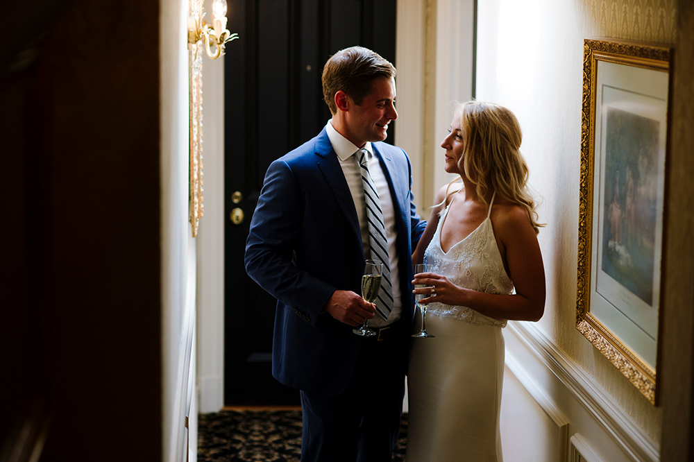 Bride and Groom pose for photo at Chandler Inn