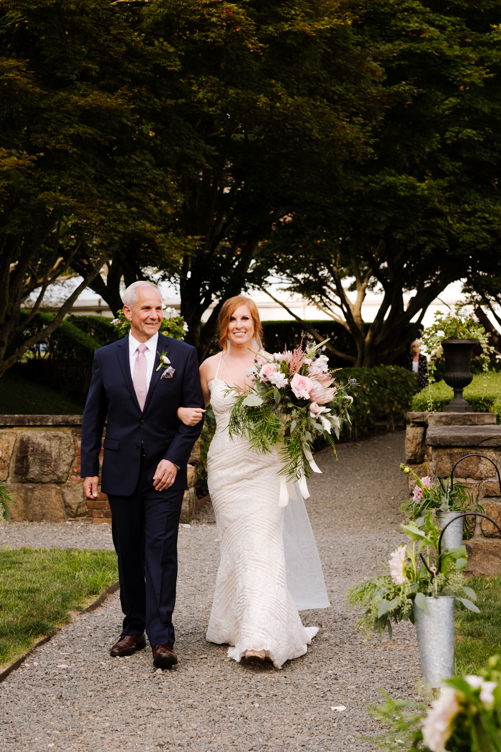 Bride walks down the aisle at Turner Hill Mansion