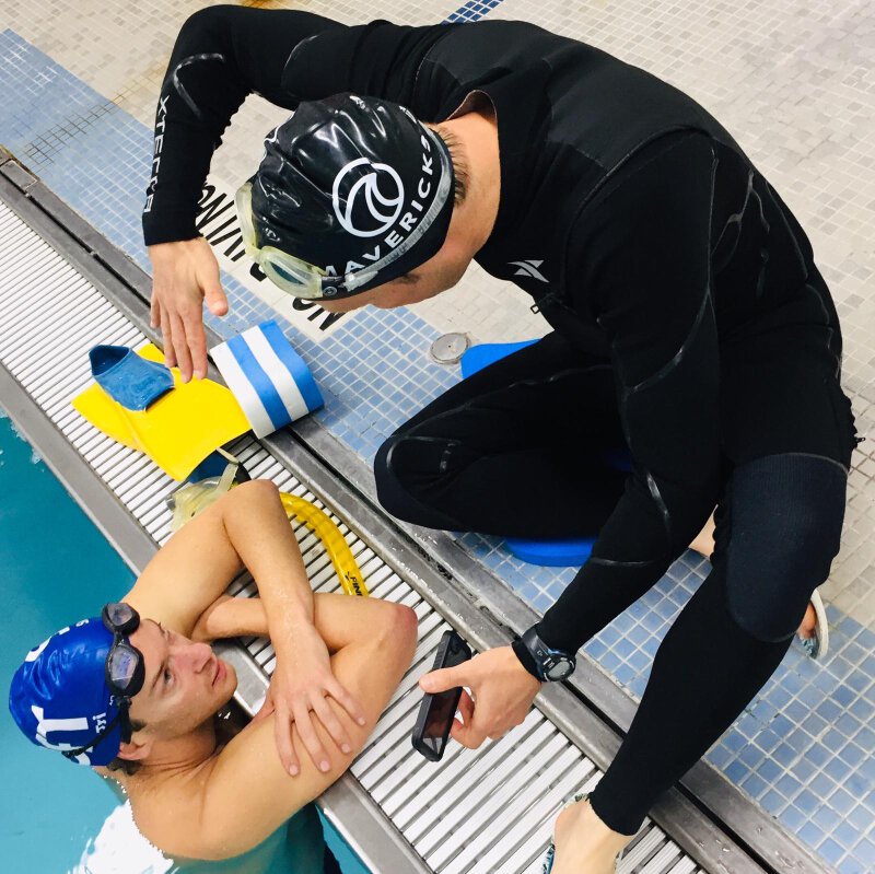 Swim-Teacher-demonstration-swim-stroke-analysis-student-in-pool.jpg