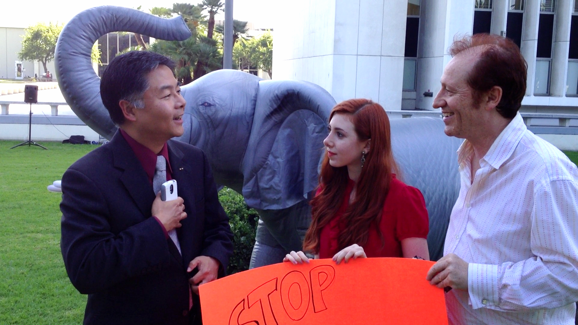 Congressman Ted Lieu meeting Huxleys at March For Elephants at the Federal building in LA