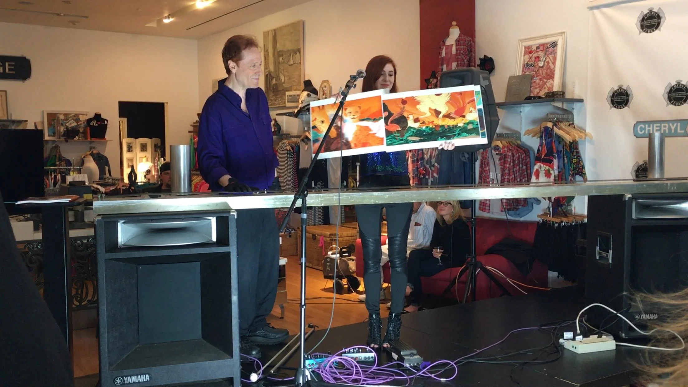 Fiona shows illustrations from her elephant children's book