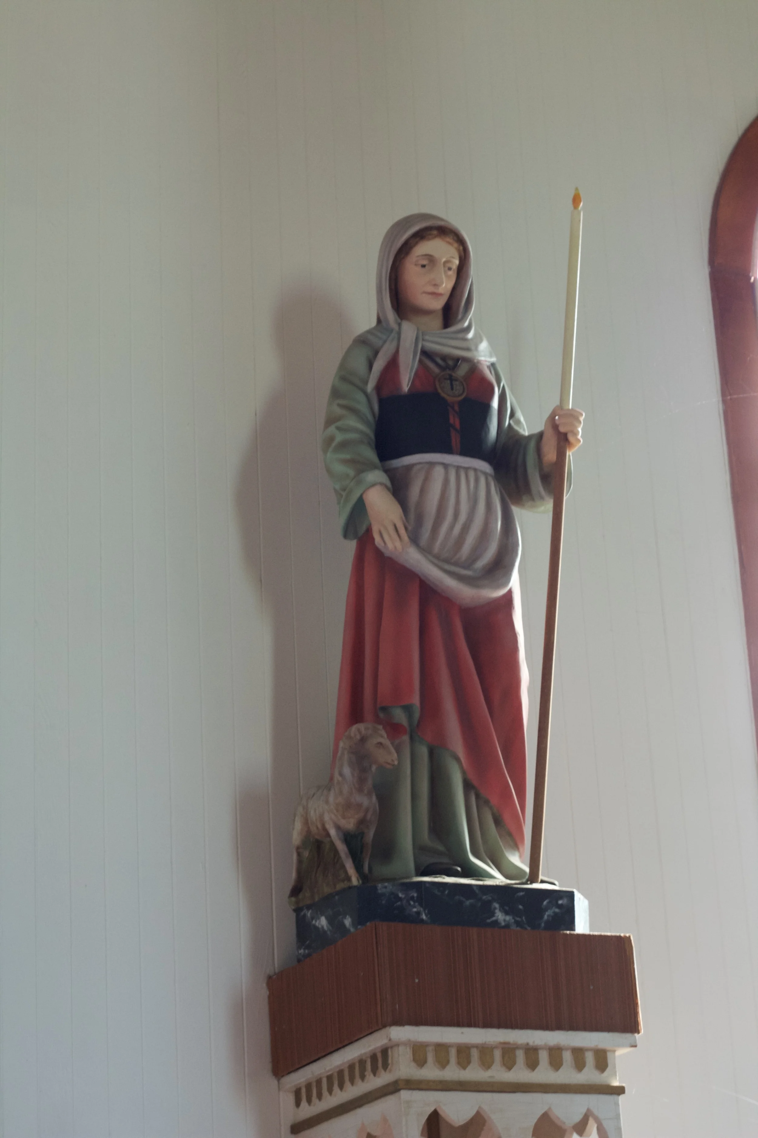 A statue of Ste Geneviève inside the church.