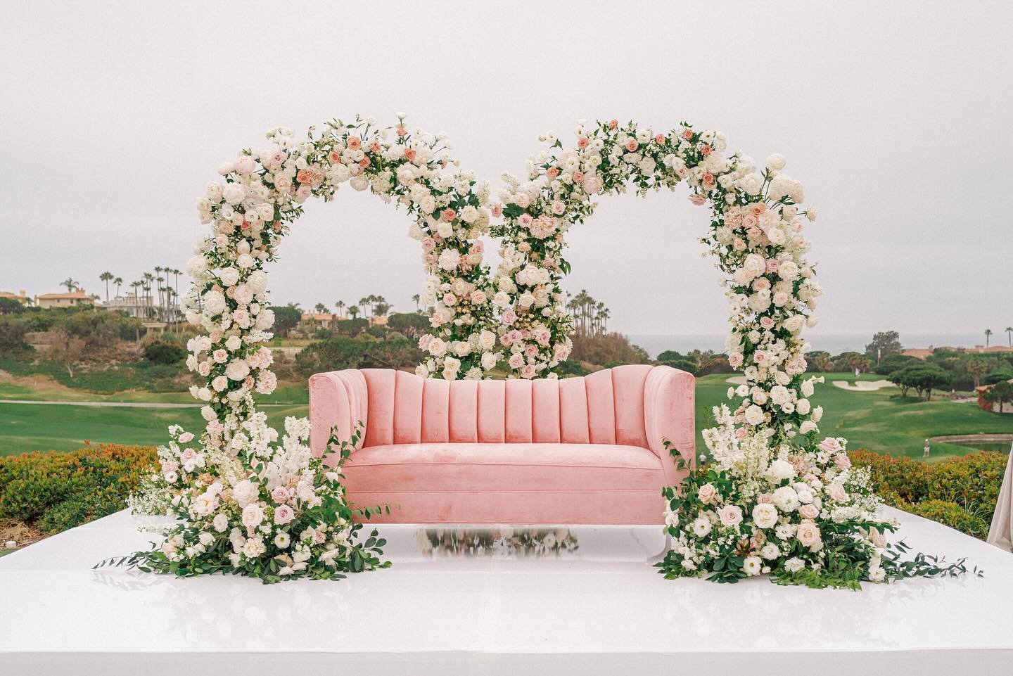 When we get to create a photo backdrop with two arch full of flowers | Photography @connieandstewart | Planning &amp; Design @cclweddings | Rentals @premiere_rents | Flowers @honeycombaffair | Venue @wamonarchbeach #pinkweddings #photobackdrop #garde