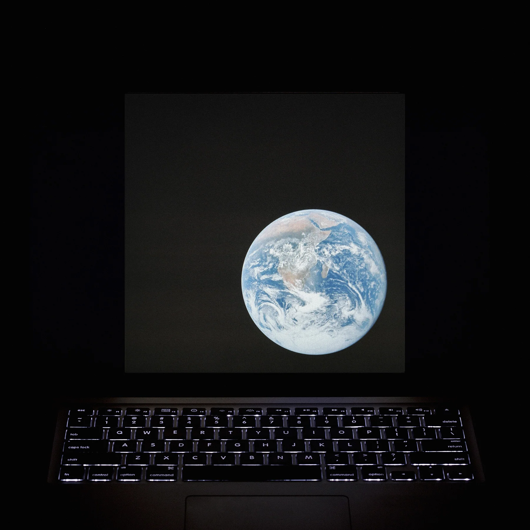 Common Sensing (Before Apollo 17-148-22727), 69x69x10cm, backlit film in lightbox (from a negative exposed with a Hasselblad 500 camera), 2013