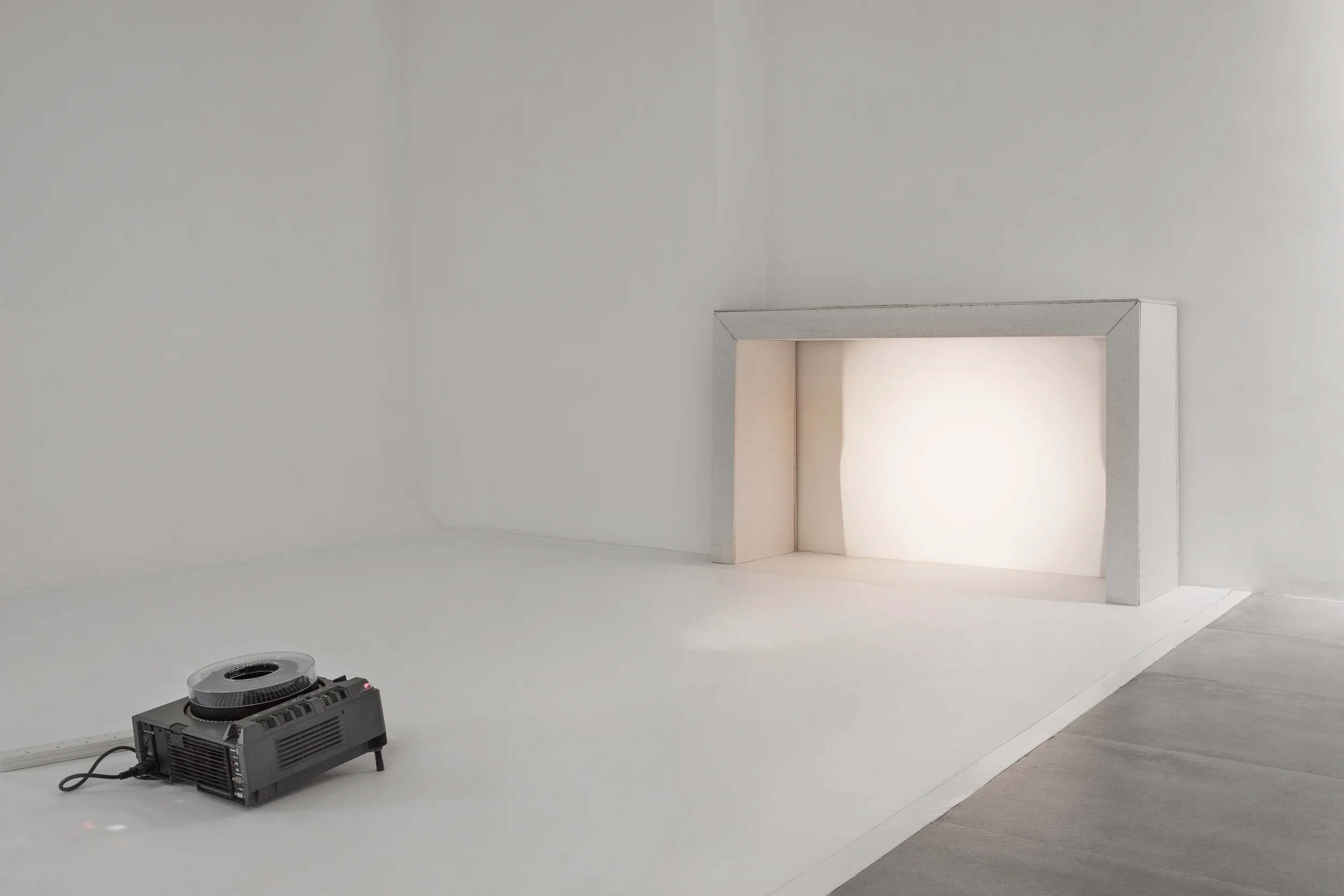 Fireplace (constructed) , 150x90x40cm, fireproof wall, 35mm slide projection, 2014