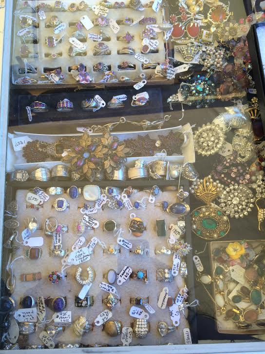 This dealer had a drool-worth collection of antique jewelry. All of her fine rings were sorted by gemstone color!
