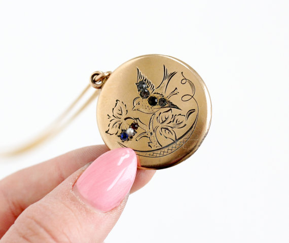 Antique Victorian swallow Locket with Colorful Rhinestones & a Single Seed Pearl. Swallows mate for life, which displayed ones love for their sweetheart, when given as a gift.