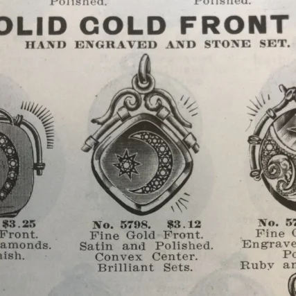 An advertisement from 1909 for a star & moon locket!