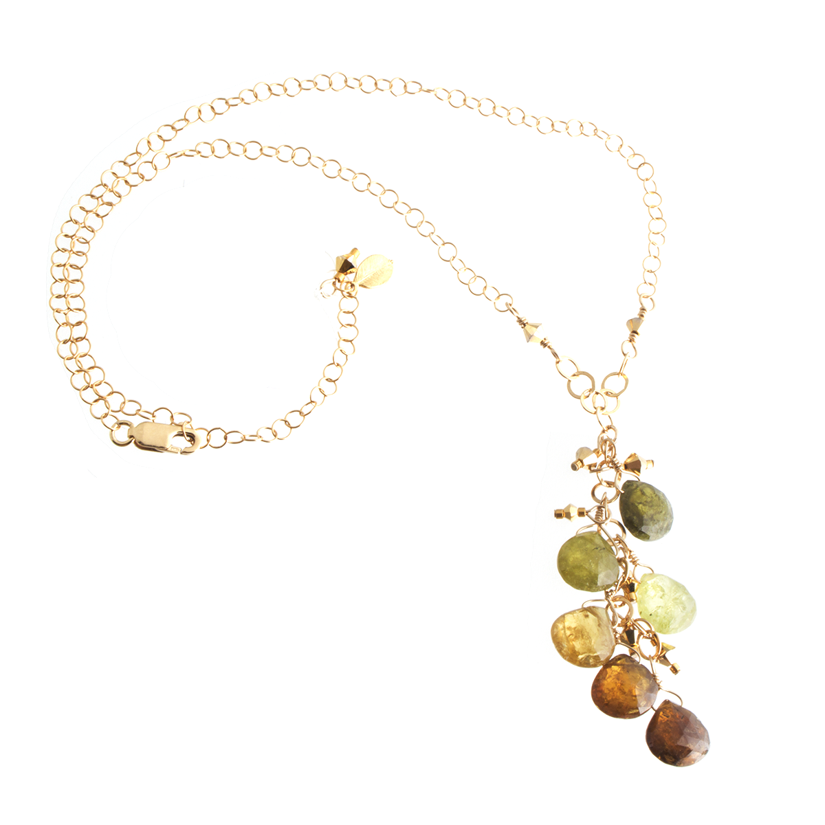 Grossular Green Garnet--seen here in Amy's lovely cascade-style necklace--ranges in hue from warm brown to vibrant green.