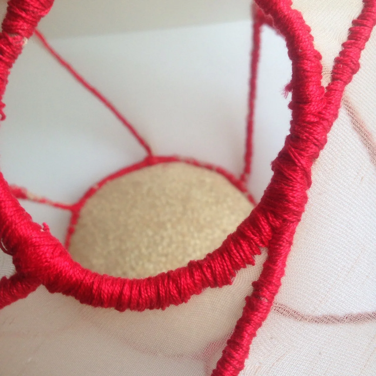 lo aprehendido sculpture III bronze, rice, thread and tights 32 x 50 x 37cm