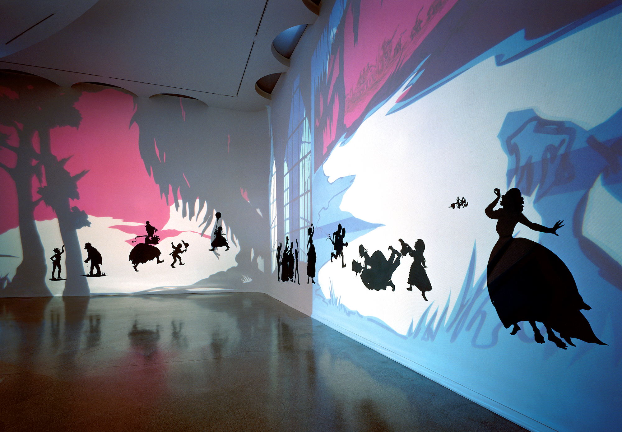  Kara Walker,&nbsp; Insurrection! (Our Tools Were Rudimentary, Yet We Pressed On) , 2000. Cut paper and projection on wall, approx. 144 x 870 inches.&nbsp;Solomon R. Guggenheim Museum, New York, 2002. Photo: Ellen Labenski 