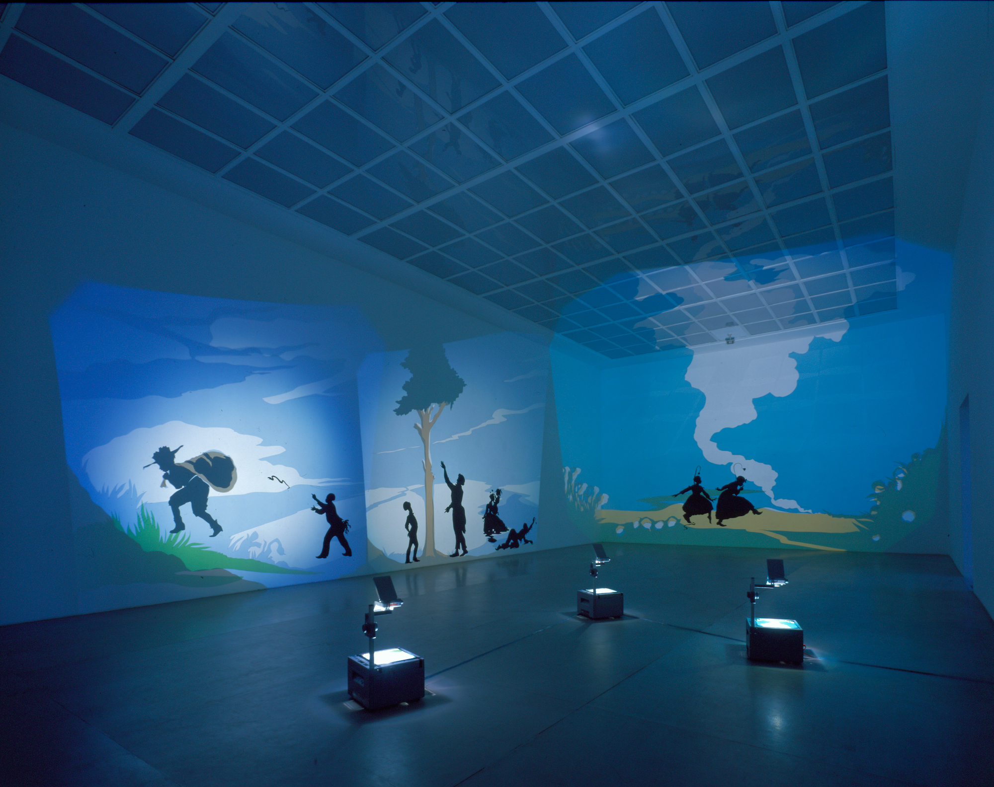 Kara Walker,&nbsp; For the Benefit of all the Races of Mankind (Mos' Specially the Master One, Boss) An Exhibition of Artifacts, Remnants, and Effluvia EXCAVATED from the Black Heart of a Negress I &amp; II , 2002. Cut paper and projection on wall, 