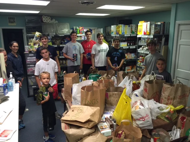 Busy day for SSA. Food drive at Temple Israel in Ridgewood. Ninety bags of food were collected from members attending Yom Kippur services. Ridgewood residents helped receive food, transport it to the pantry and shelve it.