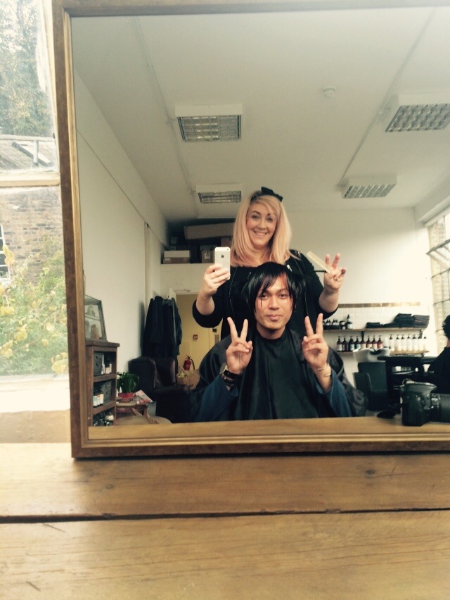 Me cutting Jun's hair