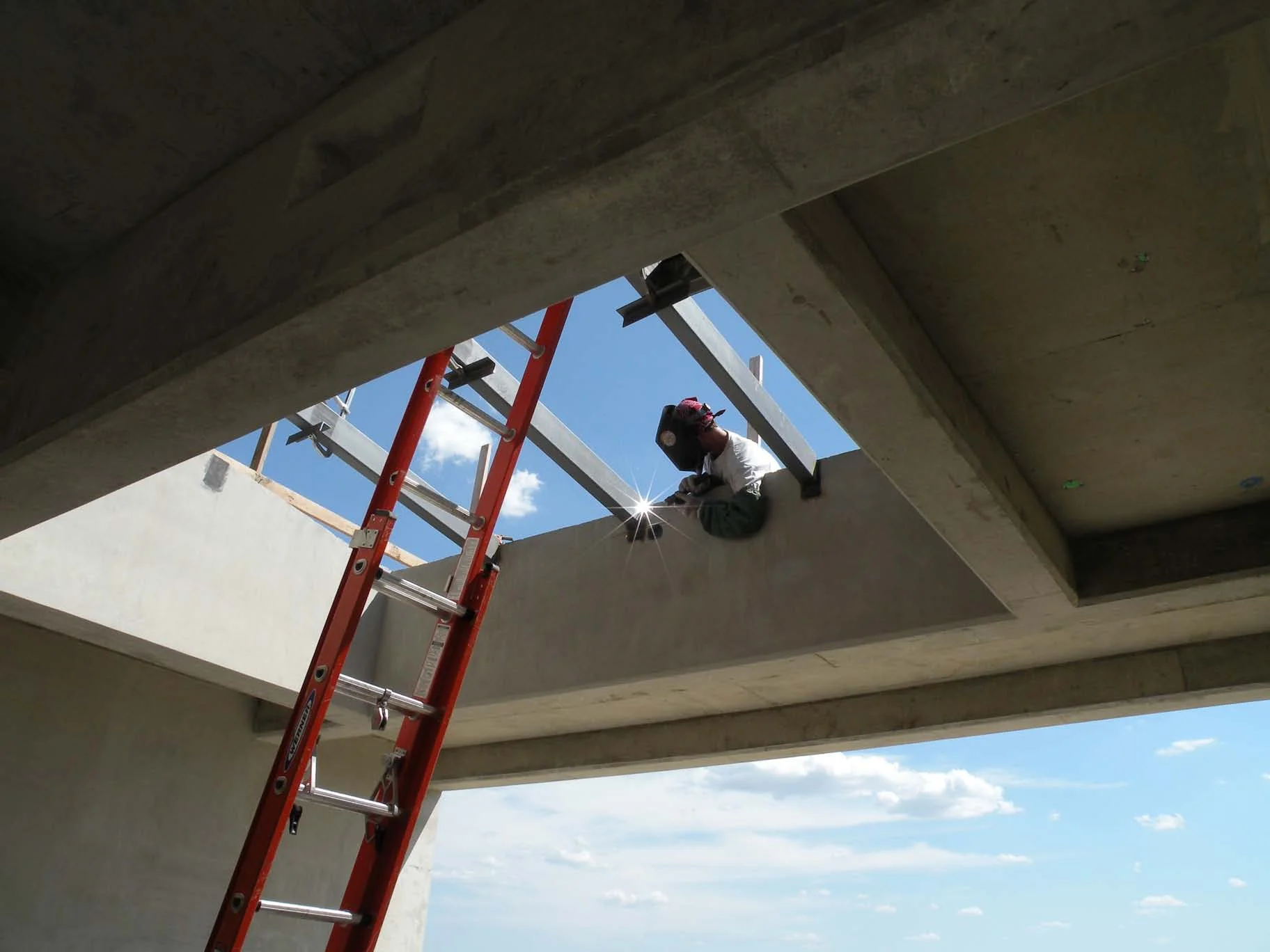 Skylight steel being welded in place.