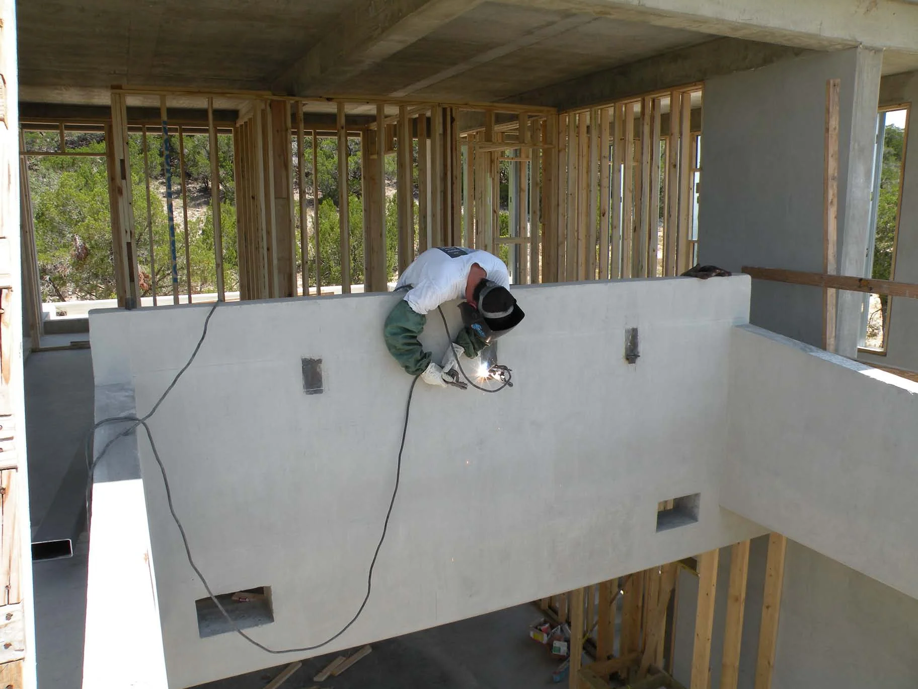 Steel embed plates being prepped for skylight steel tubing.