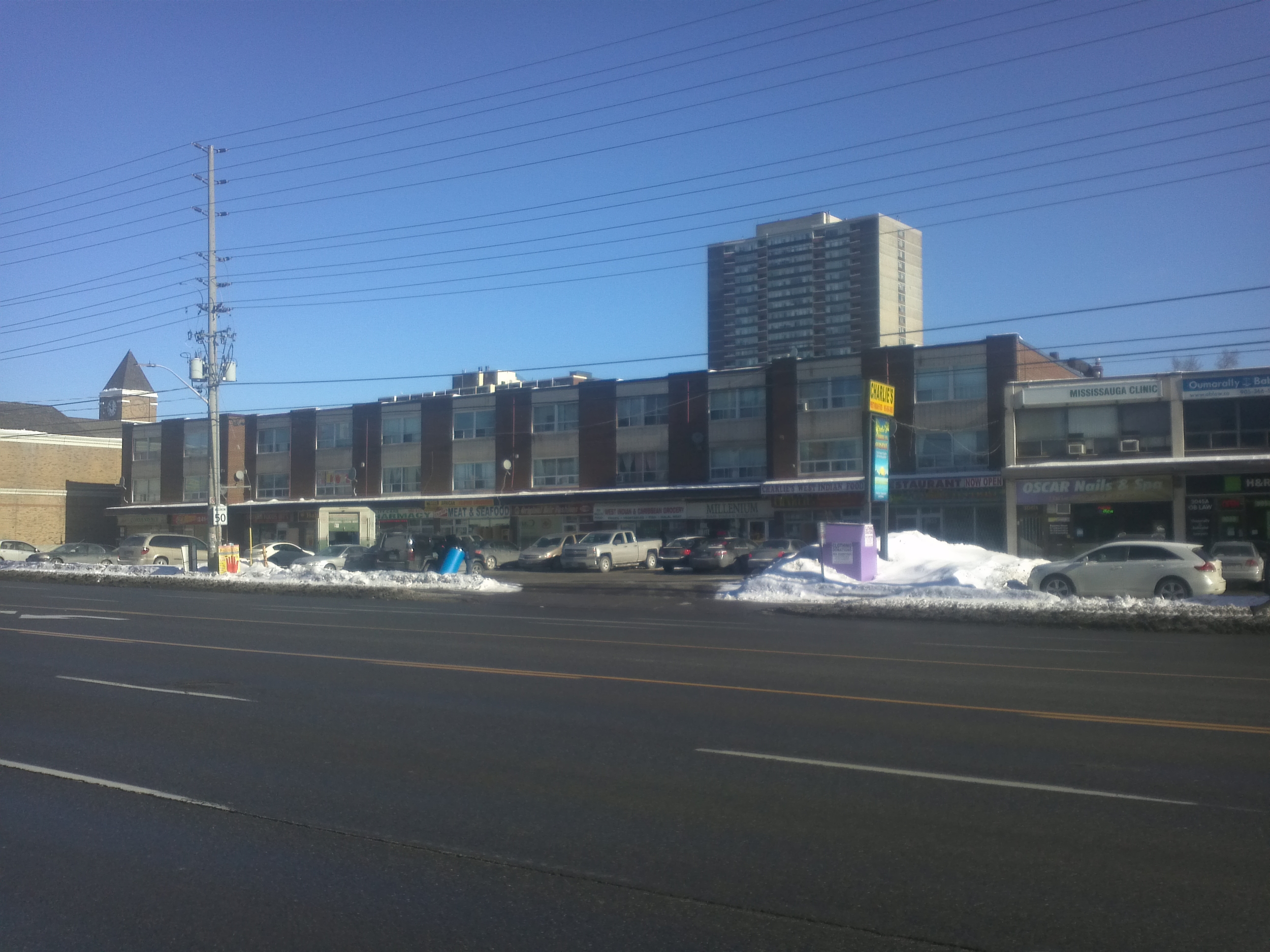 Plenty of shops, including Charlie's West Indian Food Mart, to be found at Five and Ten. Photo by Myles Marcus.