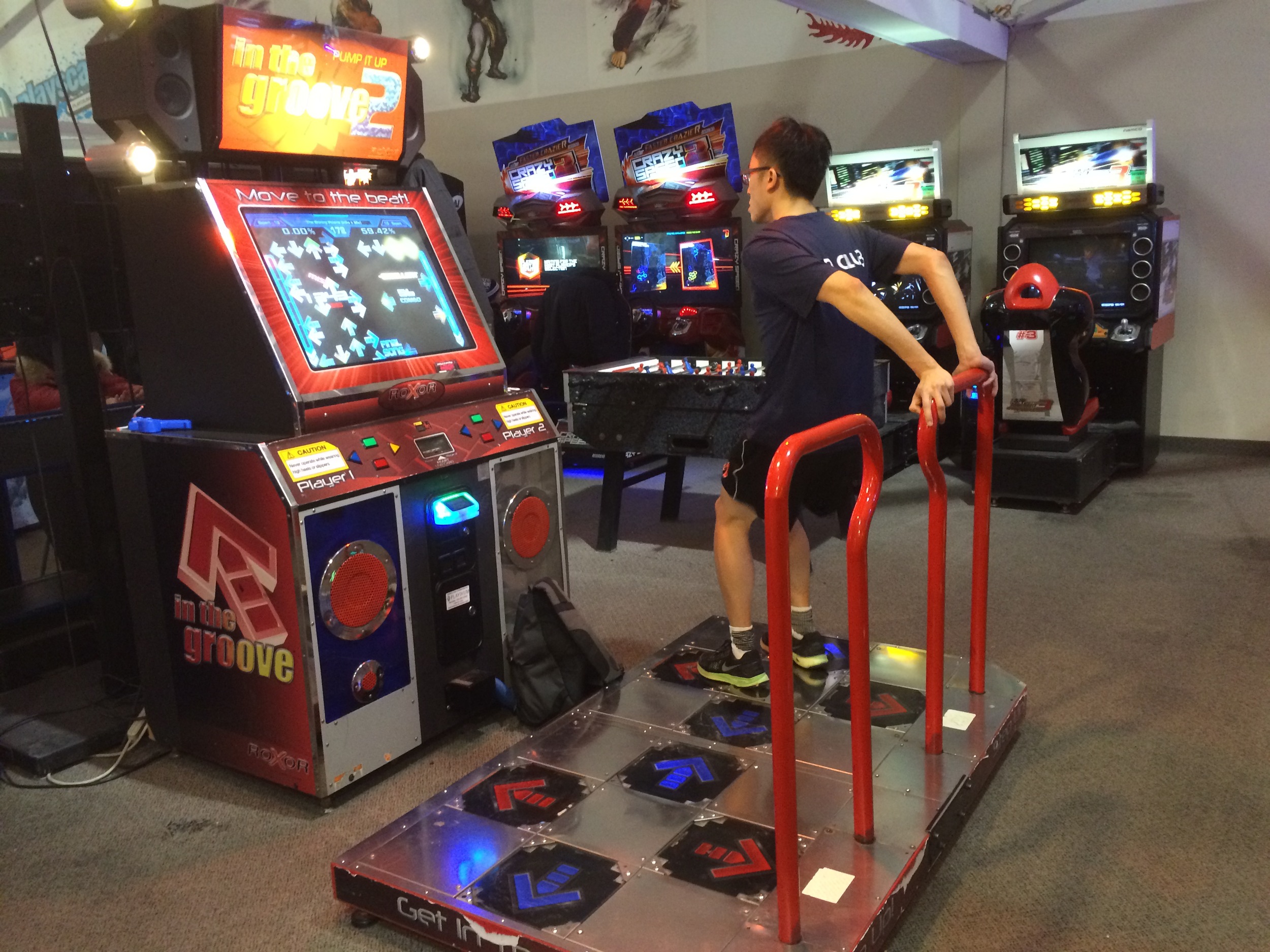 Teen practicing his dance skills at Playscape, the arcade on the second floor at Pacific Mall