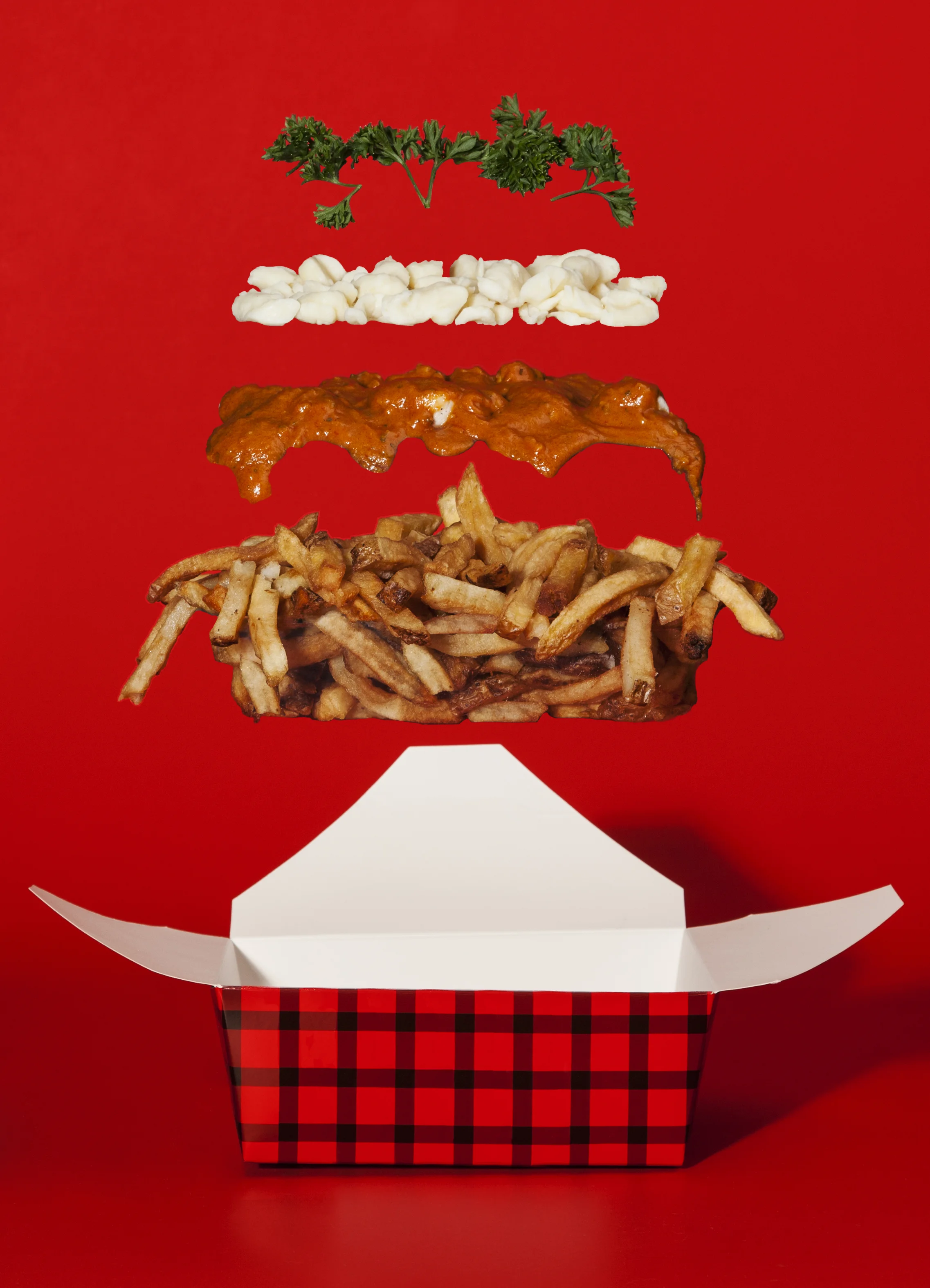 How Butter Chicken Poutine Came to Define a Nation