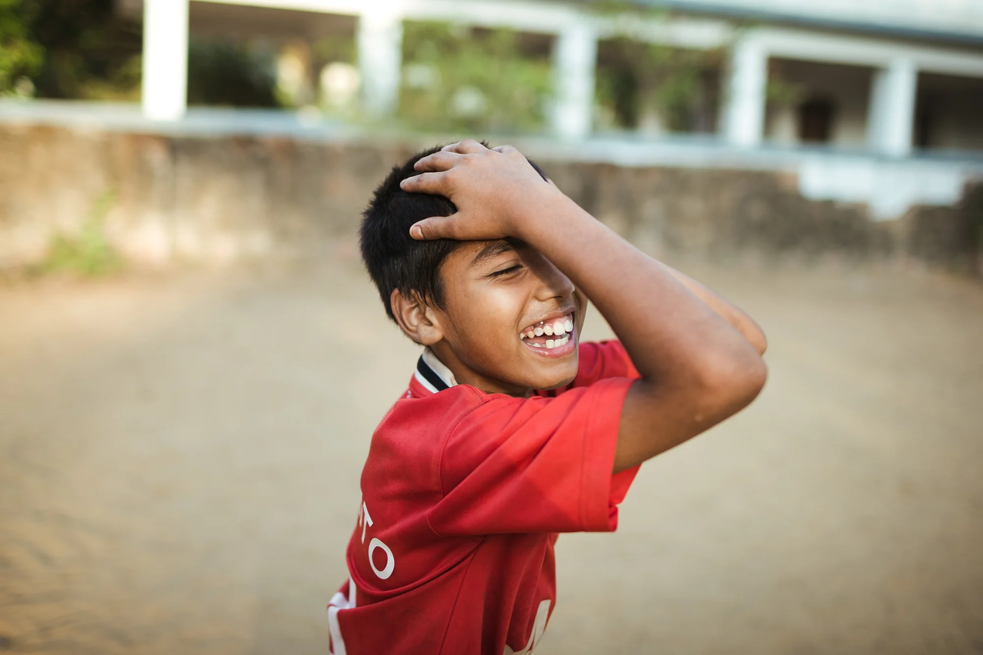 Kids playing football in Goa, India.