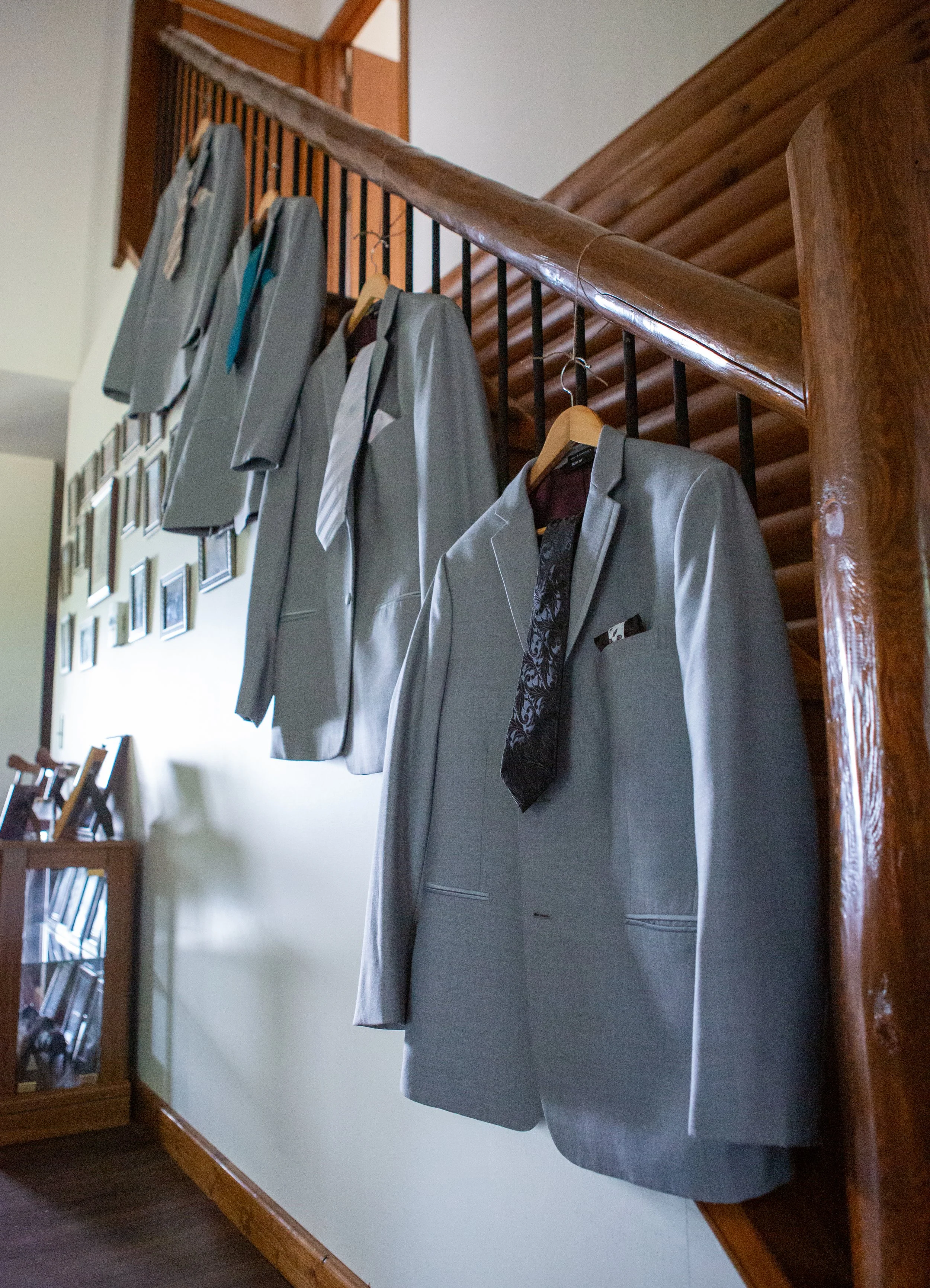 Groom suit hanging on stairway | Outdoor wedding photos | Romantic weddings in michigan | Mid michigan wedding photography