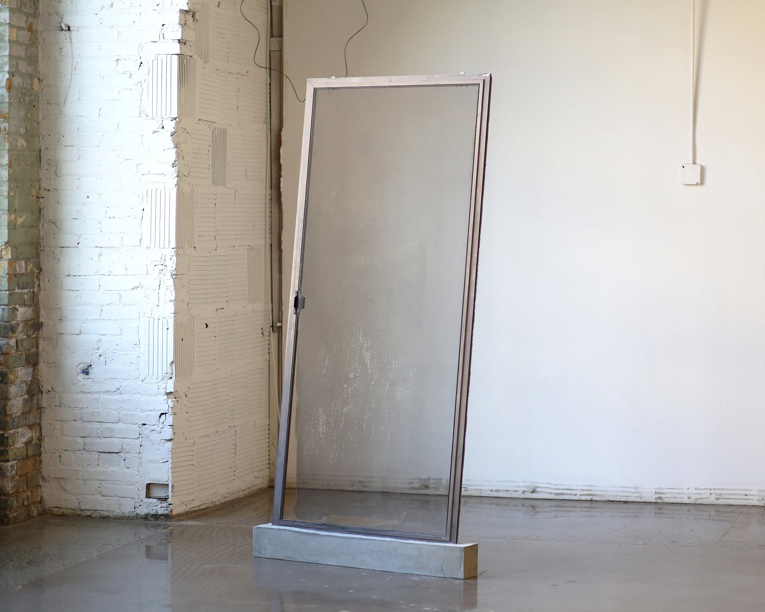 Untitled Aluminum sliding door and concrete 85” x 43” x 5” 2018