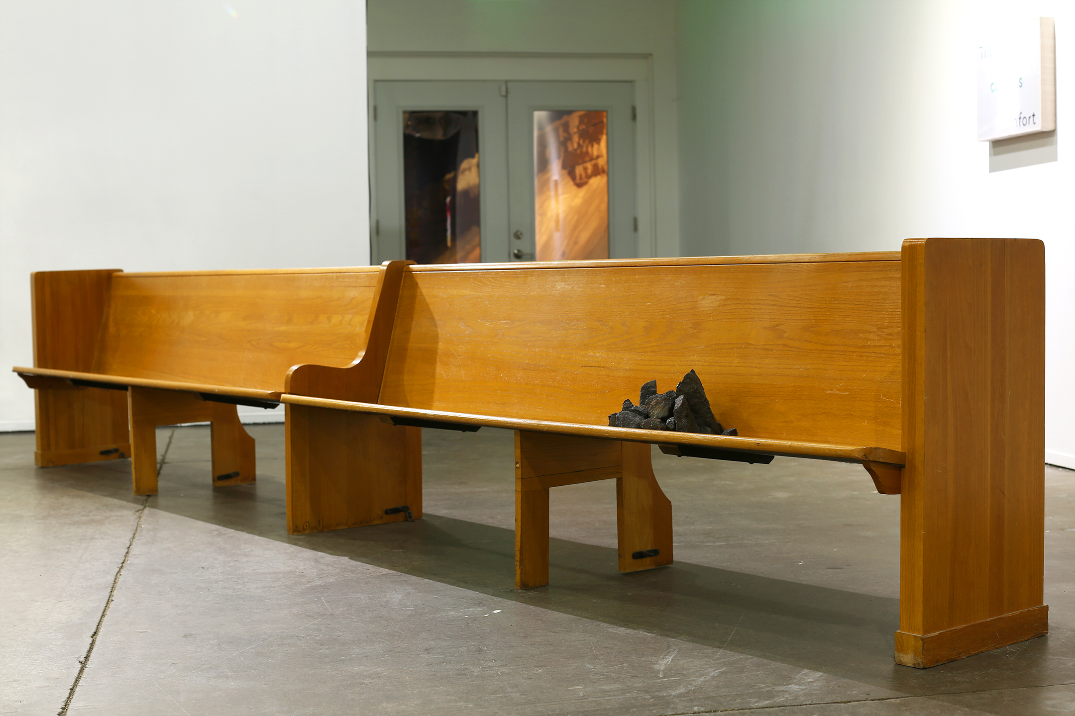   Peace be with you  1950’s Roman Catholic wood oak church pew, iron ore, peacock feathers 181” x 32” x 21” 2018 