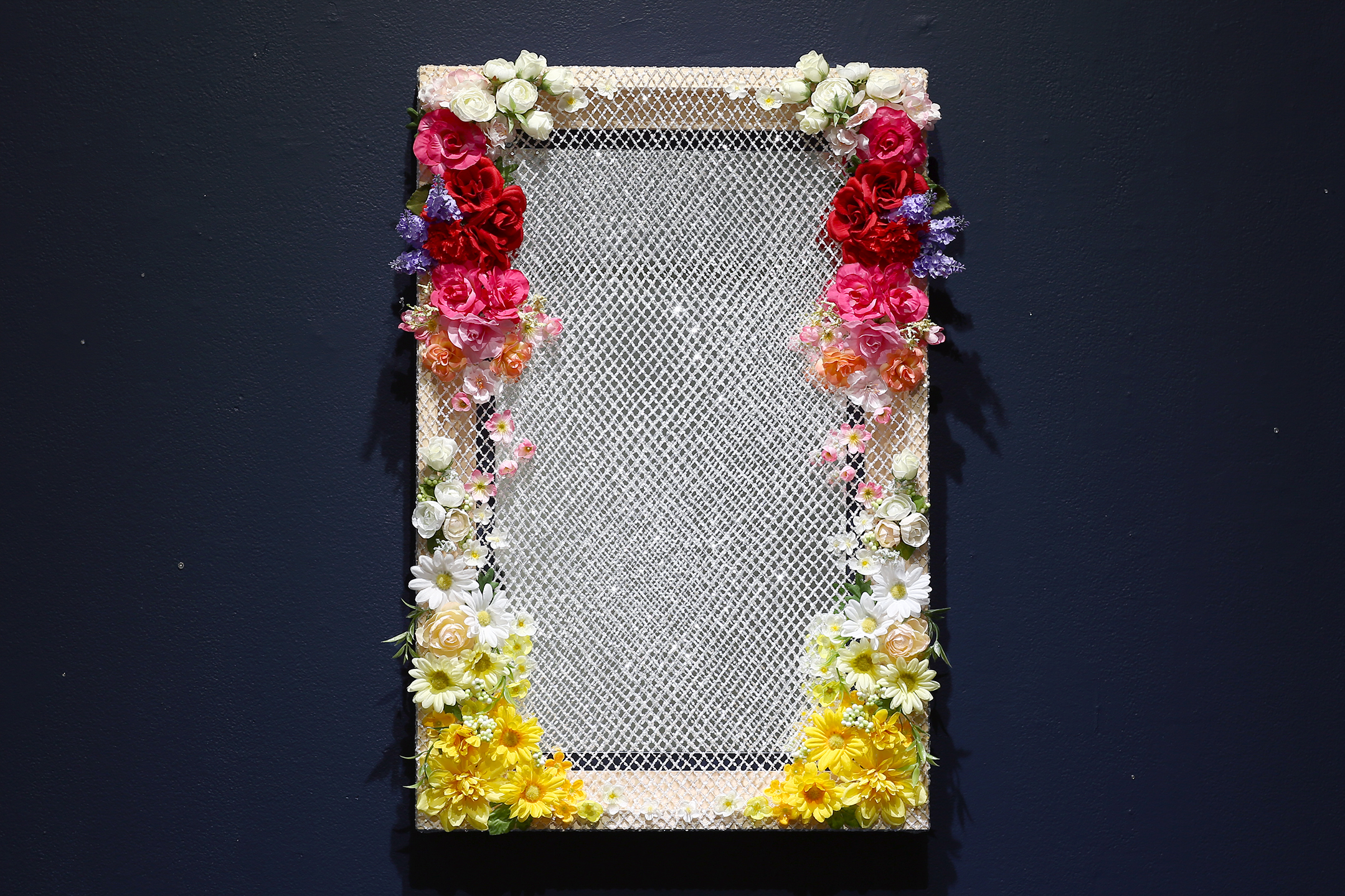   Recognition  Mirror, polyester flowers, and sequin netting on pine frame 20” x 30” 2019 