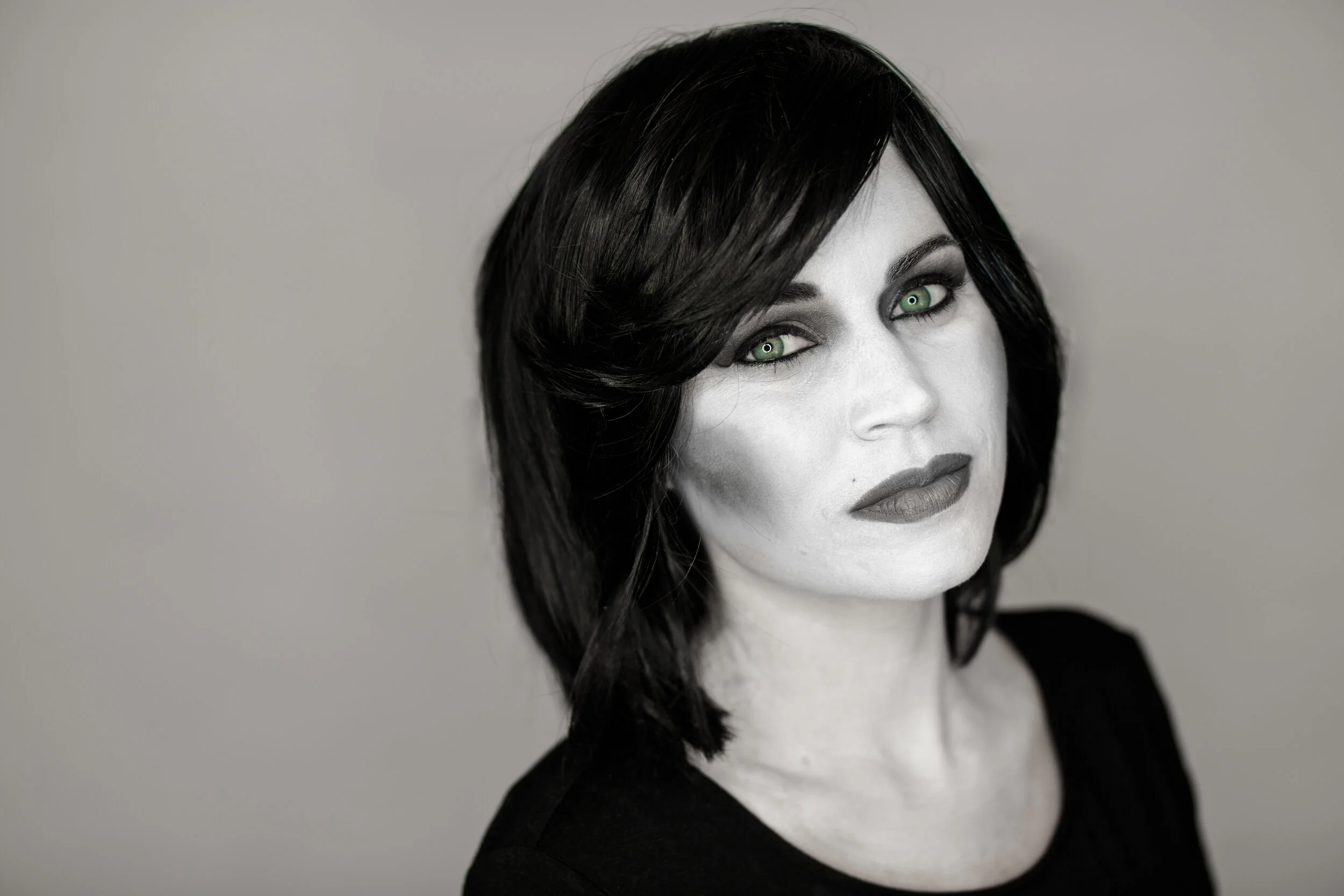 This is NOT a black and white photo. This is all black and white makeup. Look at her eyes.