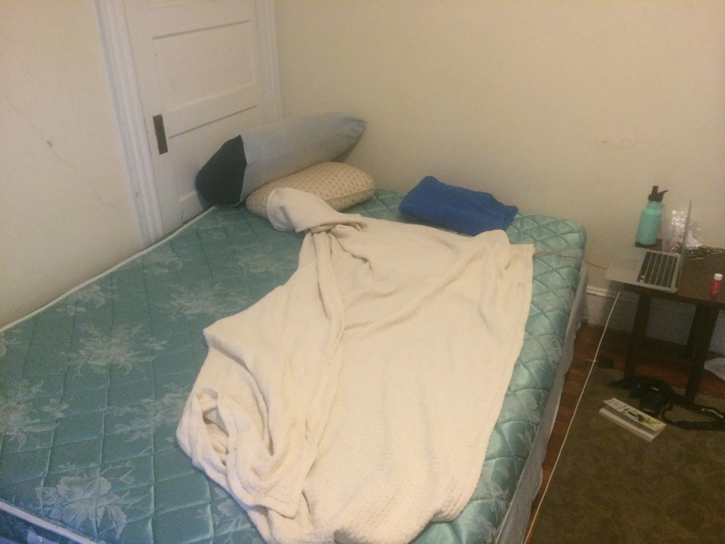 My make-shift accommodations, complete with pillows made out of clothes. 