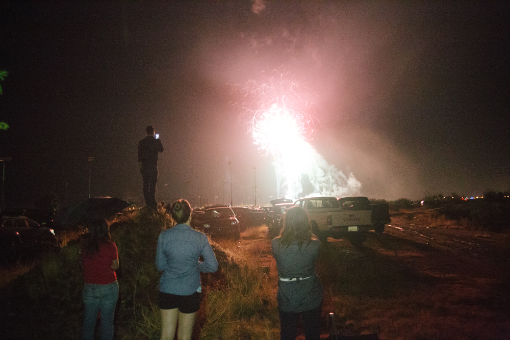 Admiring some fireworks from the ball park's parking lot.