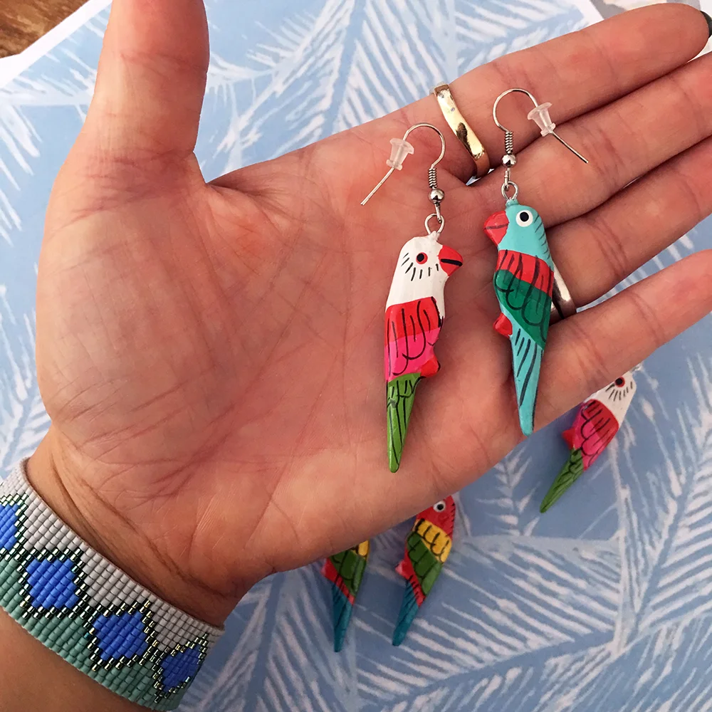 Parrot Pal earrings_hand_web.jpg