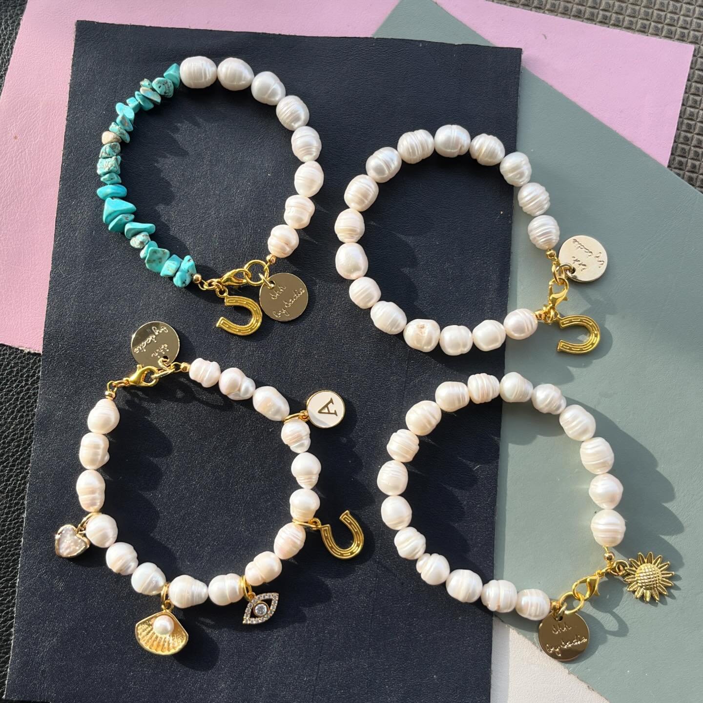 Bespoke bridal and bridesmaid bracelets for a beautiful bride (my sister!) 🥰 Alice wanted three bracelets (more is more!) and chose custom charms, genuine turquoise and big fat chunky pearls *chef&rsquo;s kiss*
.
.
#bridaljewellery #bridesmaidjewelr