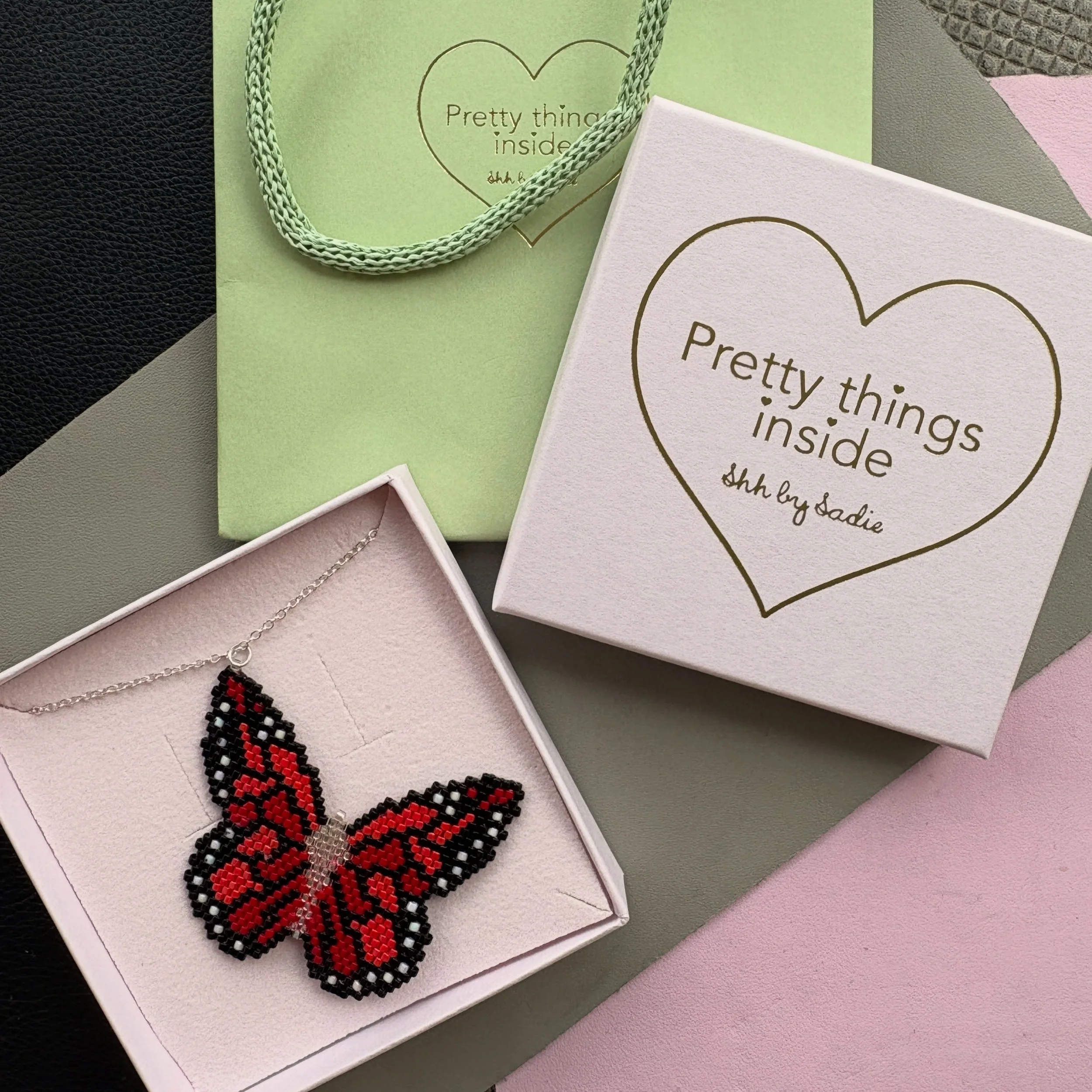 A special sparkly butterfly 🦋

This beautiful red butterfly was a bespoke order. I used contrasting red beads and sparkly silver beads so that it catches the sunlight and sparkles. Finished with a dainty sterling silver chain 🥰

#butterflynecklace 
