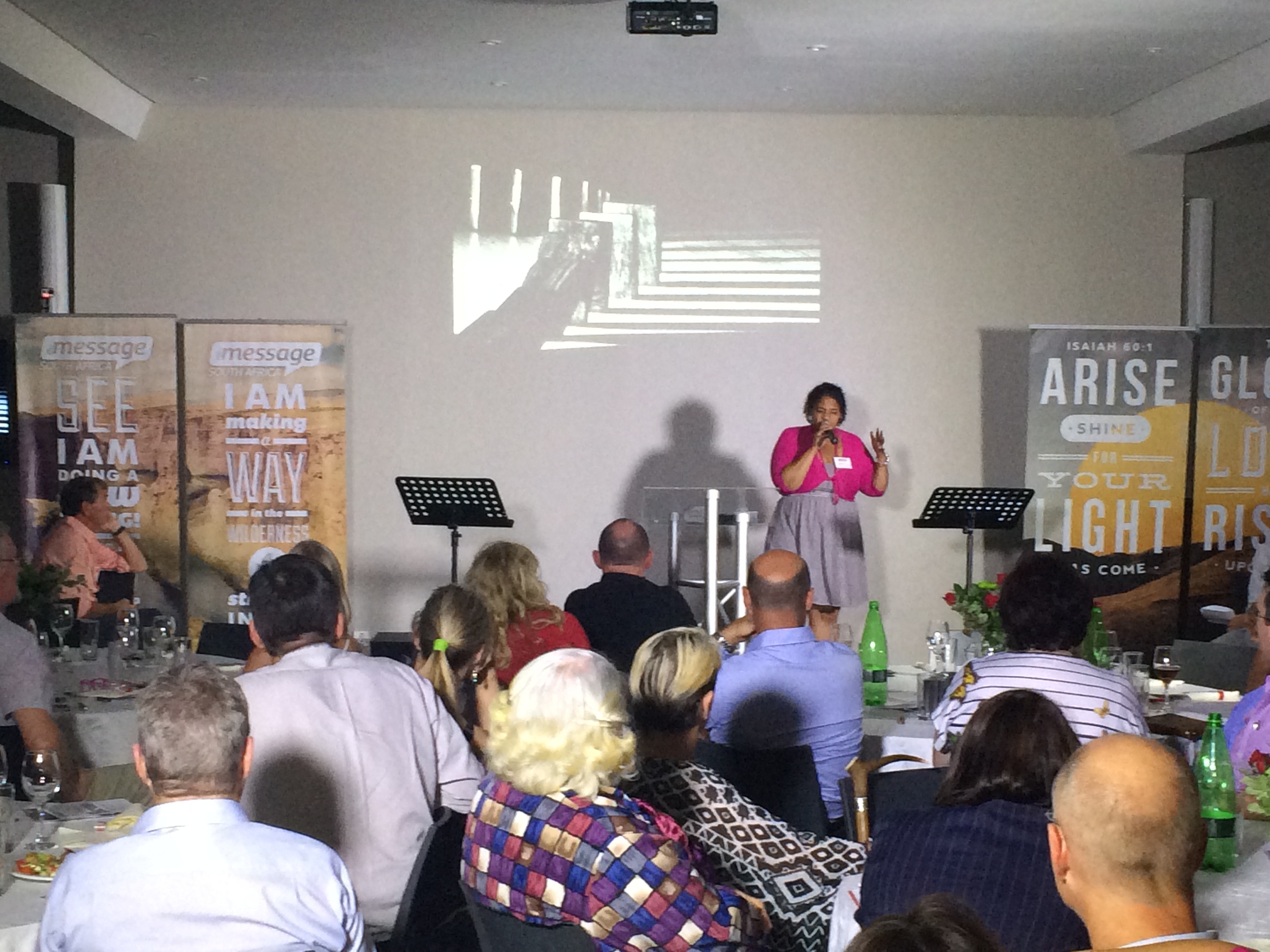 Andrea Carelse doing a spoken word on Raising Up Urban Heroes.