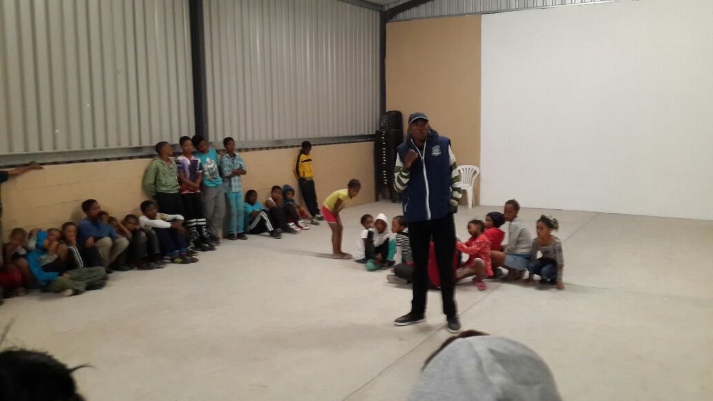 Chumani sharing his story with children from the local community 0f Citrusdal.