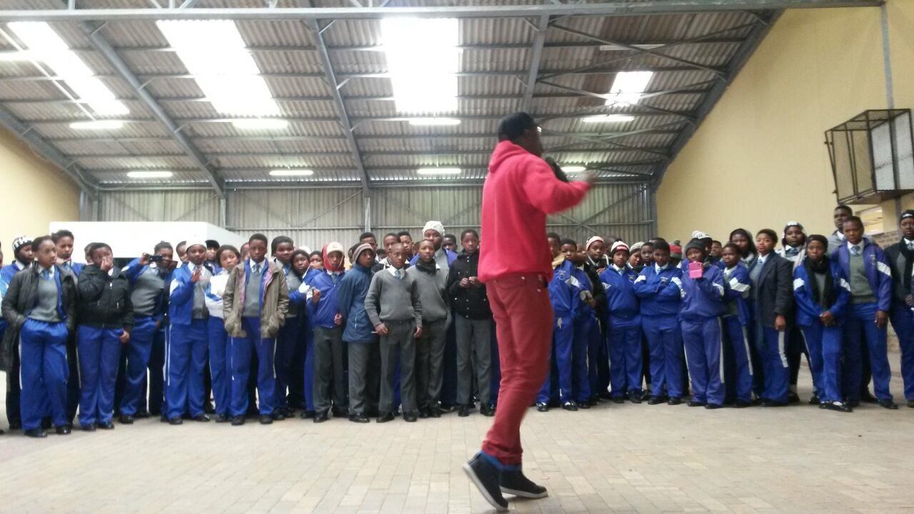Vuyo Nyabaza speaking with local youth in one of Nyanga's biggest schools.